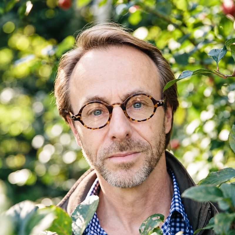Mark Tredinnick among green foliage